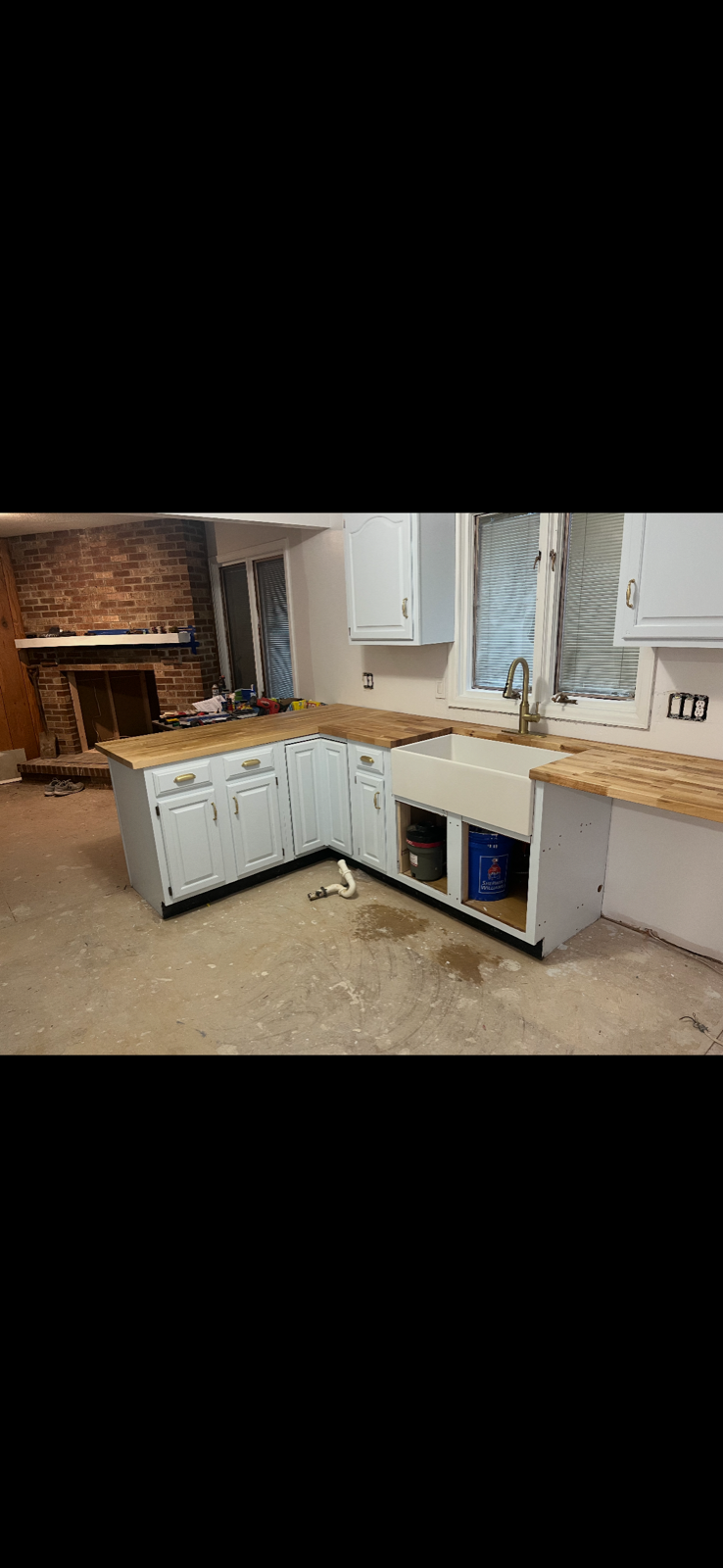 New kitchen cabinets being installed